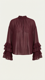 Burgundy sheer high mock neck top with layered ruffle cuffs and sleeves