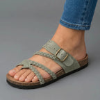 Light green braided sandals with adjustable buckle strap, open toe, flat comfort sole