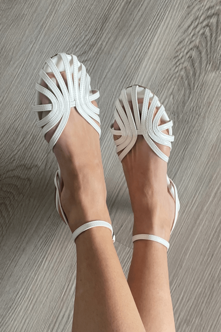Braided platform slide sandals with white straps and crisscross toe band
