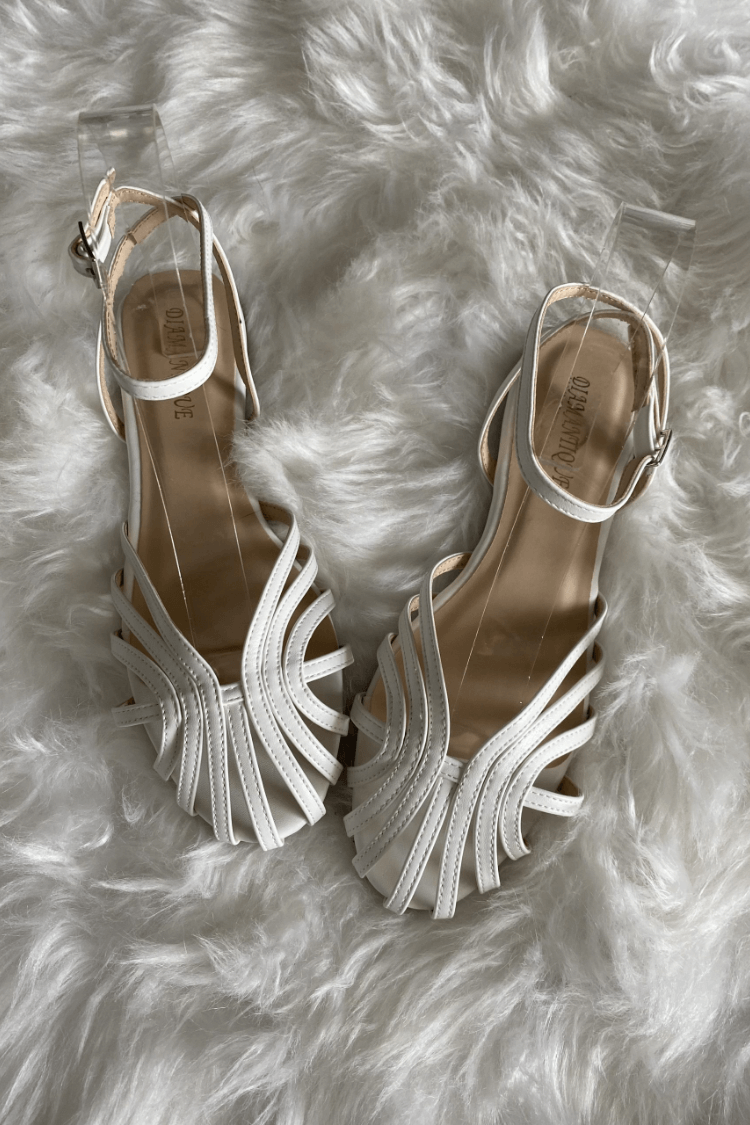 Braided platform slide sandals in white with metallic trim and crisscross toe straps