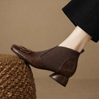 Brown leather square-toe ankle boots with elastic side and embossed circular logo