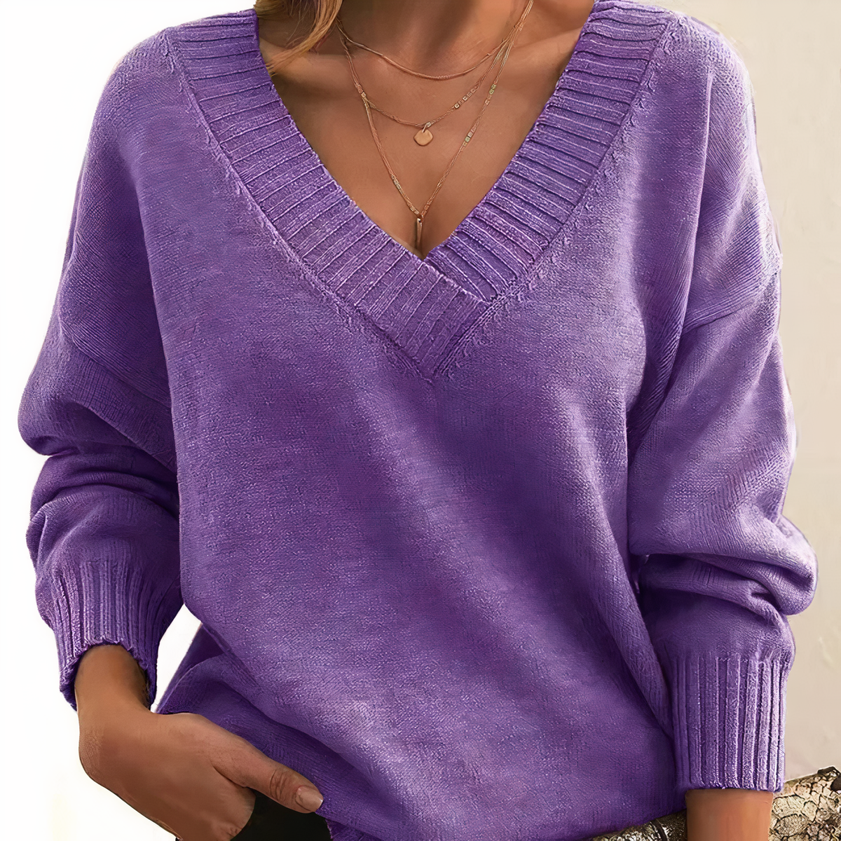 Purple cashmere V-neck sweater with ribbed trim and relaxed balloon sleeves