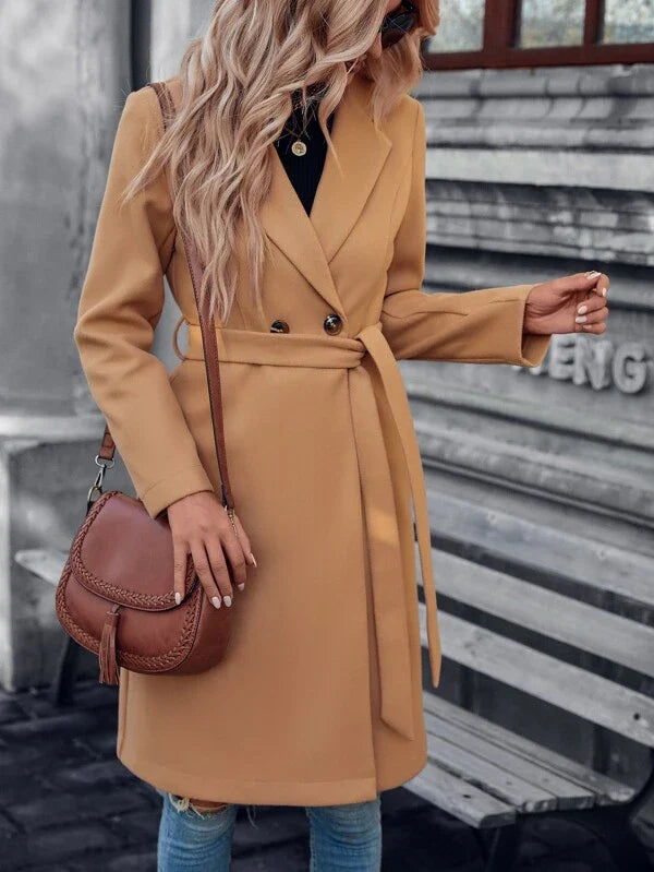 Beige long A-line coat with double-breasted front and waist belt tie, front view