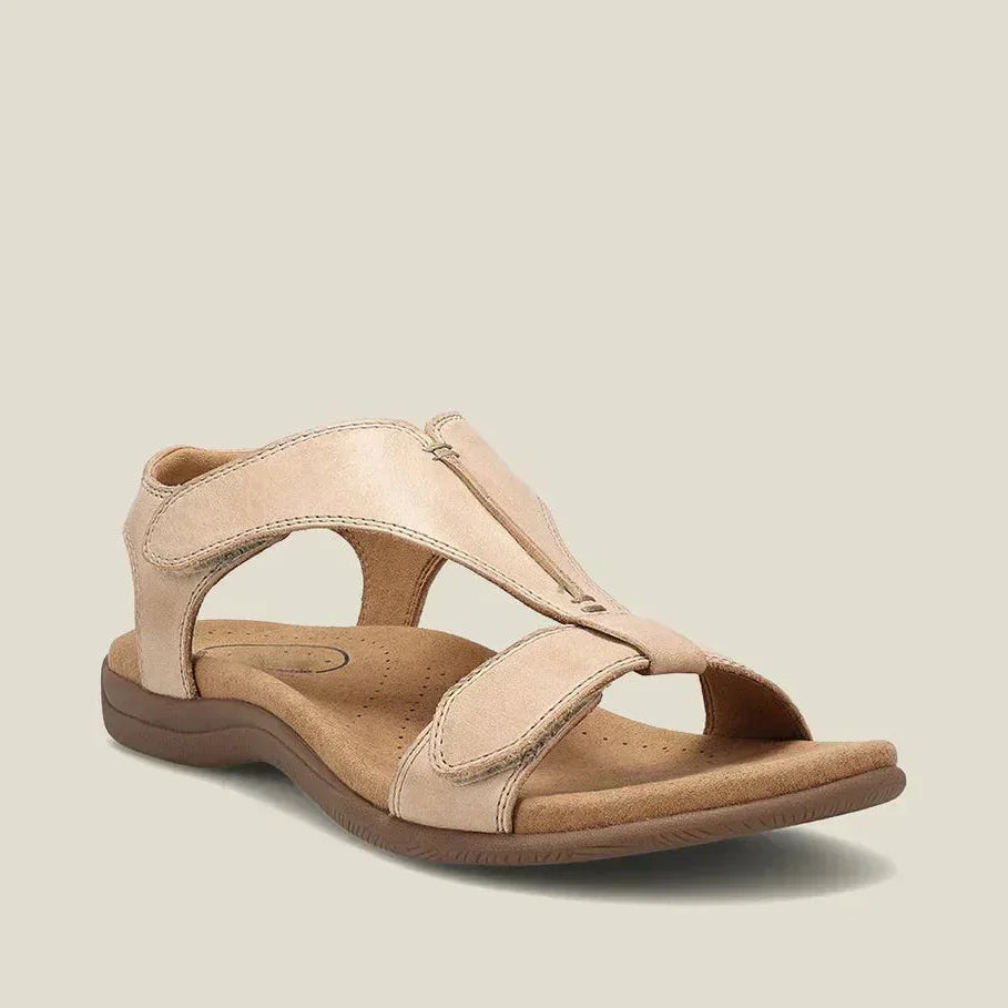 Beige adjustable strap sandals with open toe and soft padded footbed