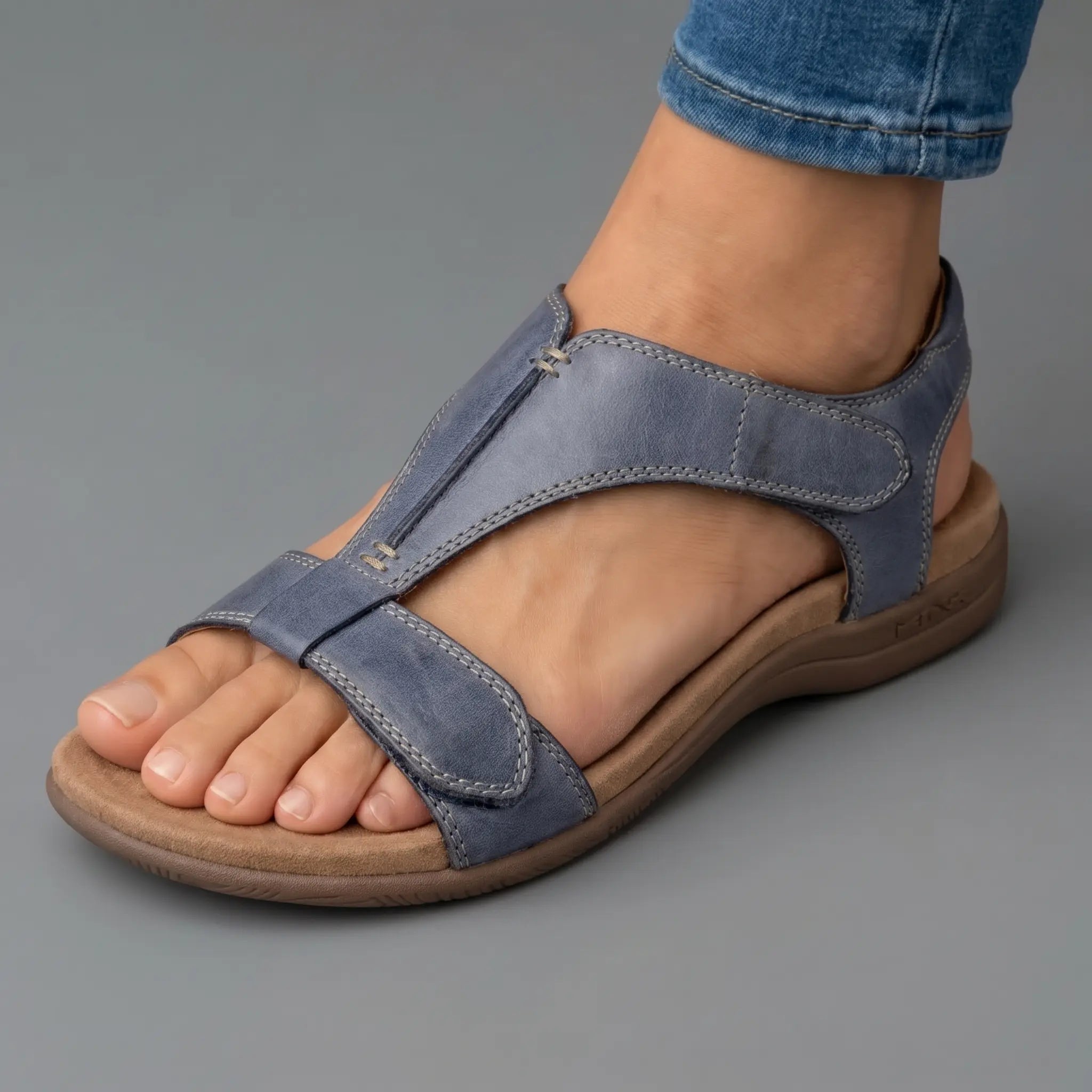 Light blue adjustable strap sandals with open toe and comfort footbed