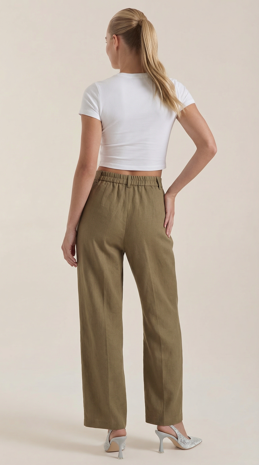 High-rise wide-leg pants in olive green with elastic waistband and straight wide legs