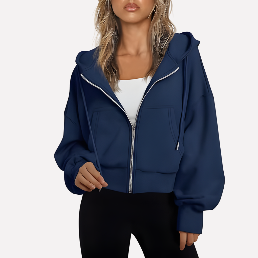 Women's zip-front cropped hoodie in navy with hood, drawstring, and front pockets