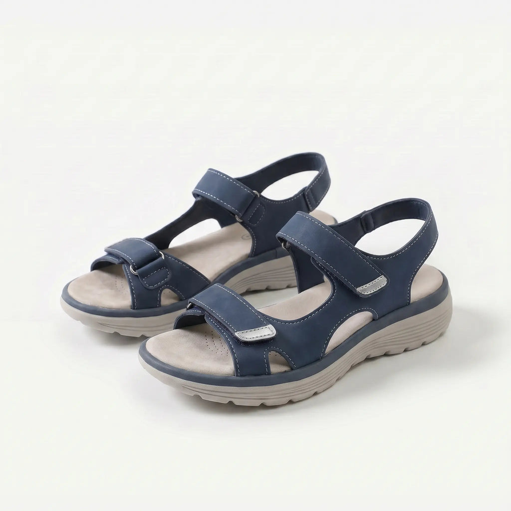 Cushioned adjustable casual sandals in dark blue with two hook-and-loop straps