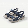 Cushioned adjustable casual sandals in dark blue with two hook-and-loop straps