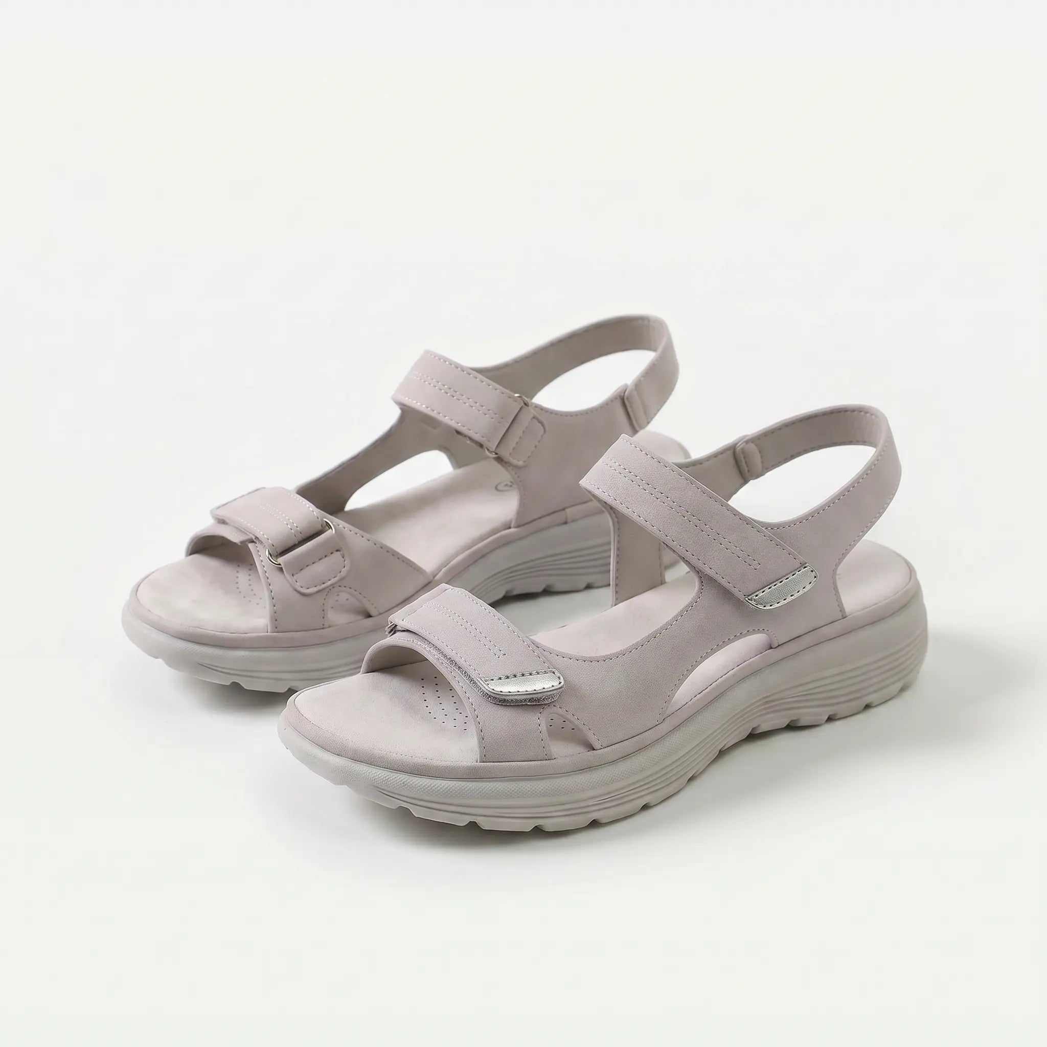 Cushioned adjustable casual sandals in light beige with two adjustable hook-and-loop straps