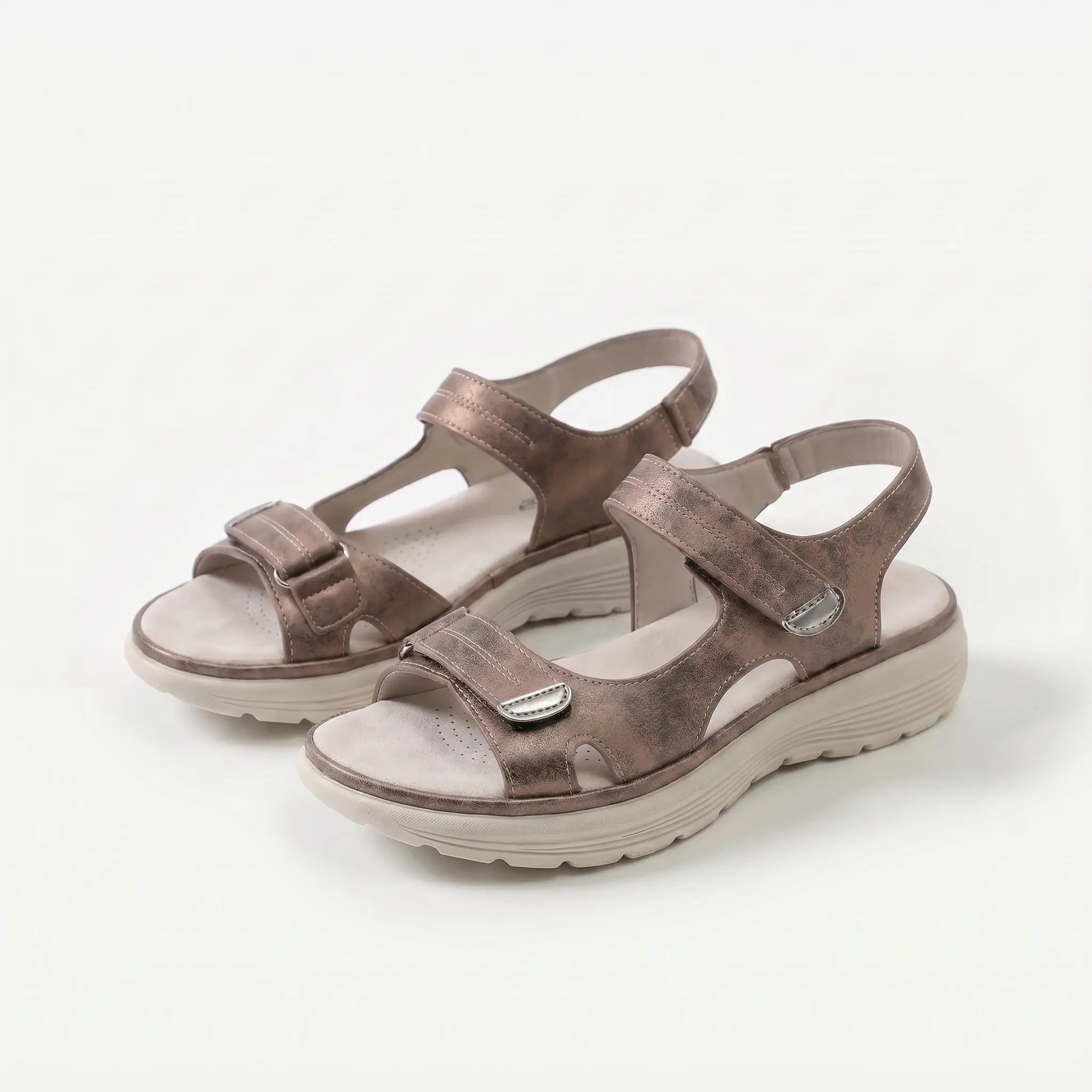 Cushioned adjustable casual sandals in brown with two hook-and-loop adjustable straps