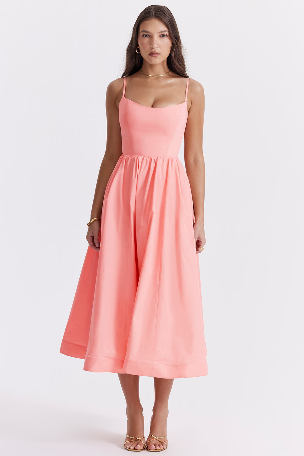 Pink corset midi dress with spaghetti straps, sweetheart neckline, and flared gathered skirt