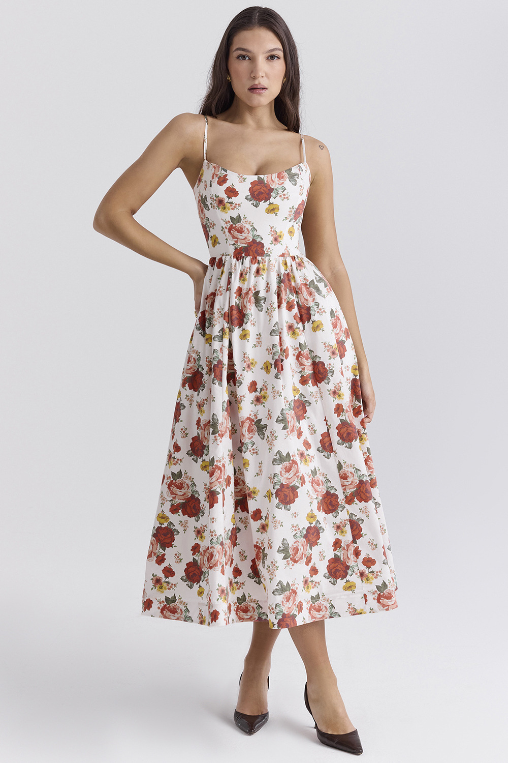 White floral corset midi dress with thin straps and gathered full skirt