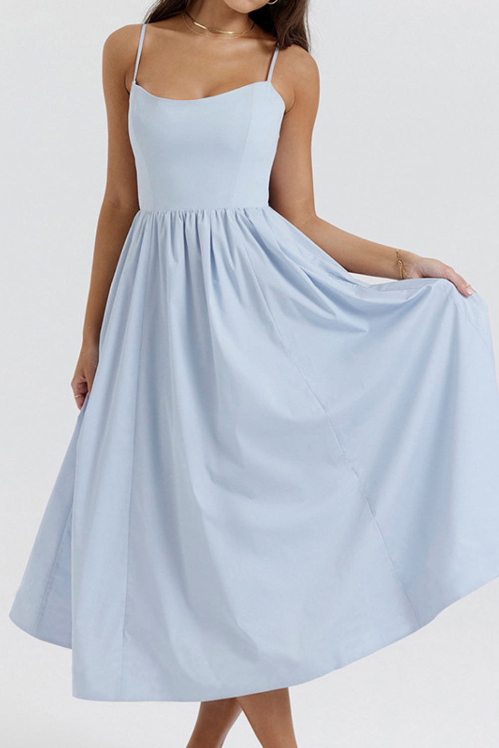 Light blue corset midi dress with spaghetti straps, gathered waist, and full skirt