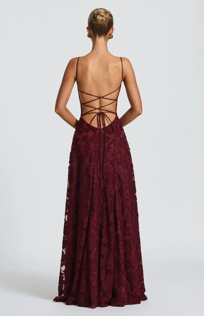 Burgundy lace maxi dress with crisscross open back straps and full lace skirt