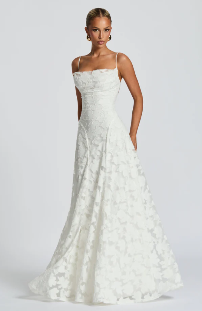 White lace maxi dress with ruched lace bodice, sleeveless straps and full A-line skirt