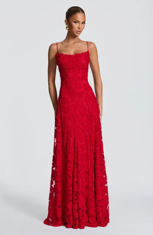 Red lace maxi dress with thin straps, fitted bodice and full lace maxi skirt