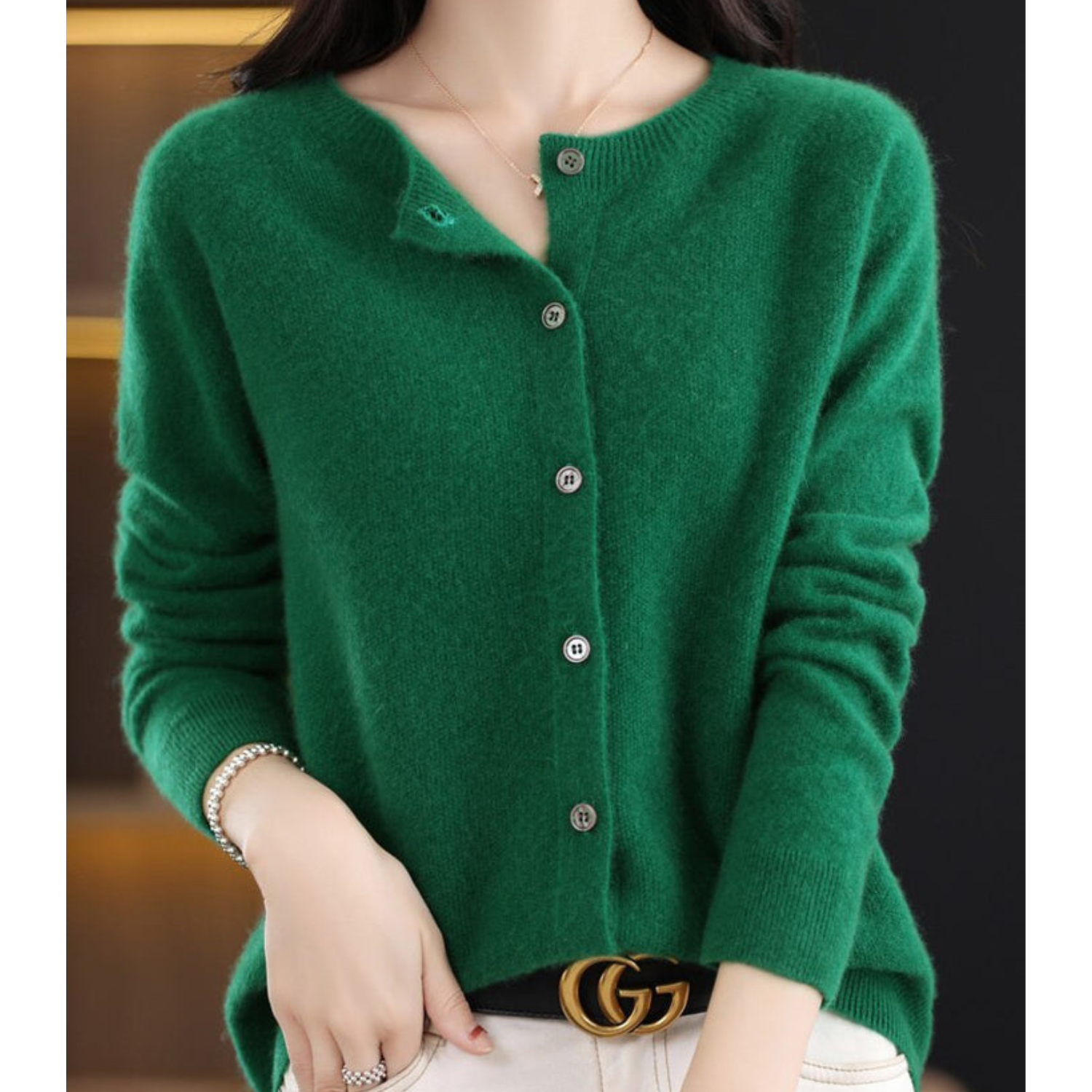 Women’s knit cardigan, deep green button-front with round neck and long sleeves