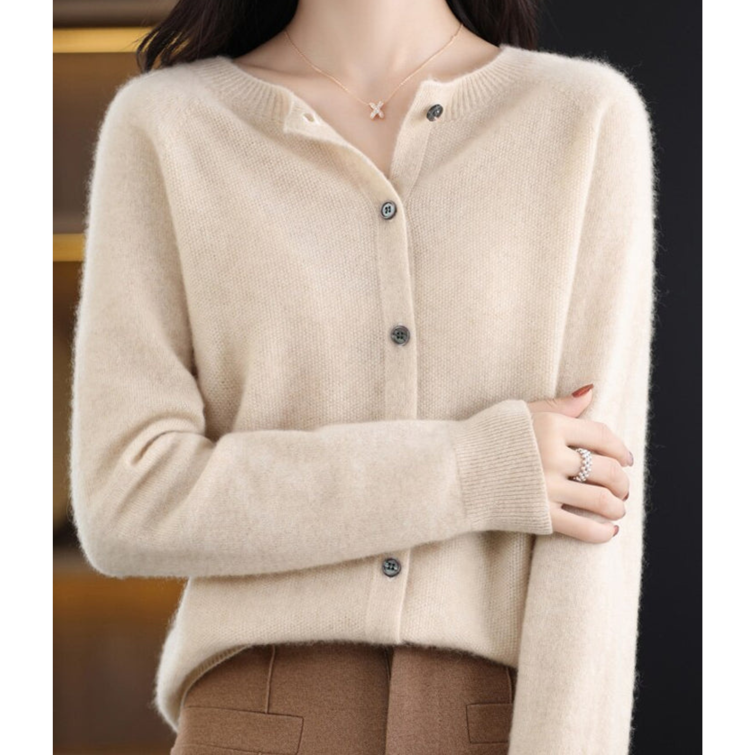Women’s knit cardigan, cream button-front with round neck and long sleeves