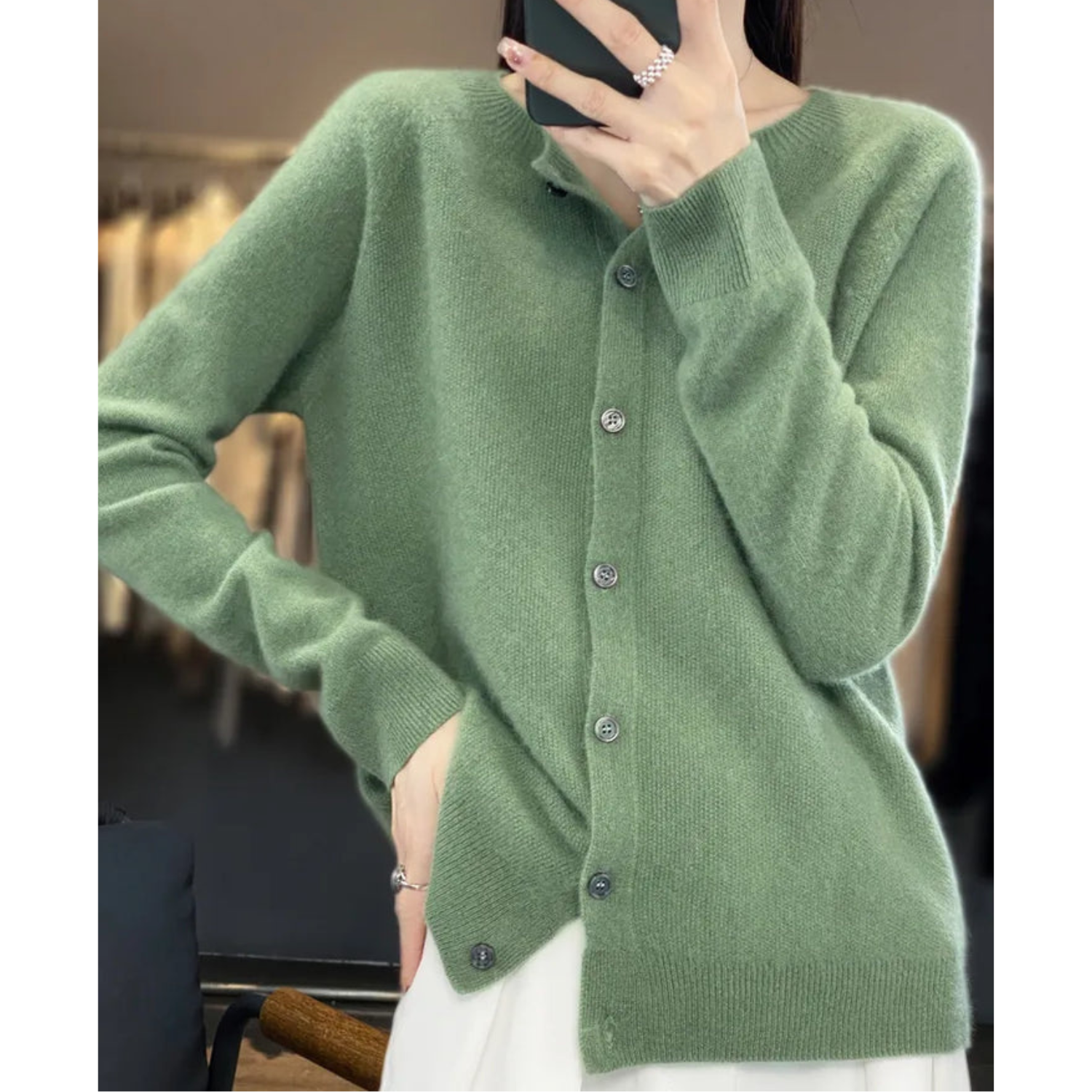 Women’s knit cardigan, sage green button-front with round neck and long sleeves