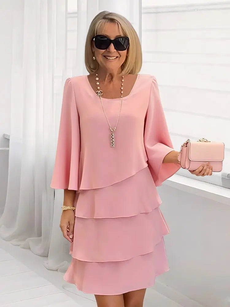 Women's pink ruffle A-line midi dress with layered tiers and three-quarter bell sleeves