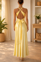 Women’s yellow sleeveless maxi dress with open back crisscross straps
