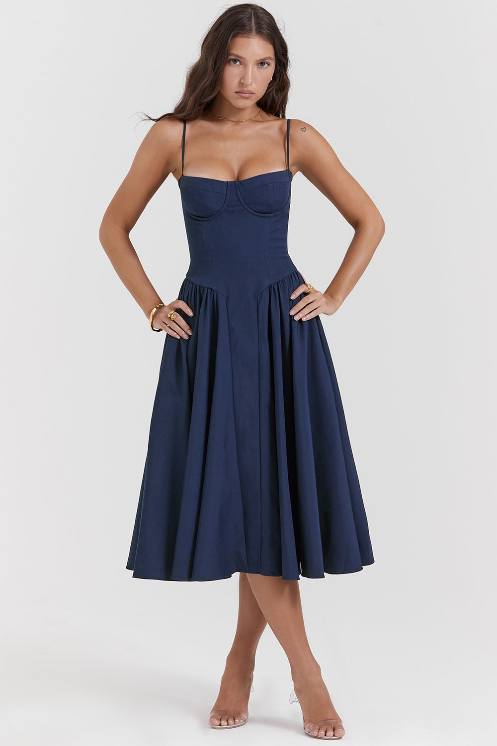 Navy blue A-line midi dress with spaghetti straps and sweetheart neckline, pleated skirt