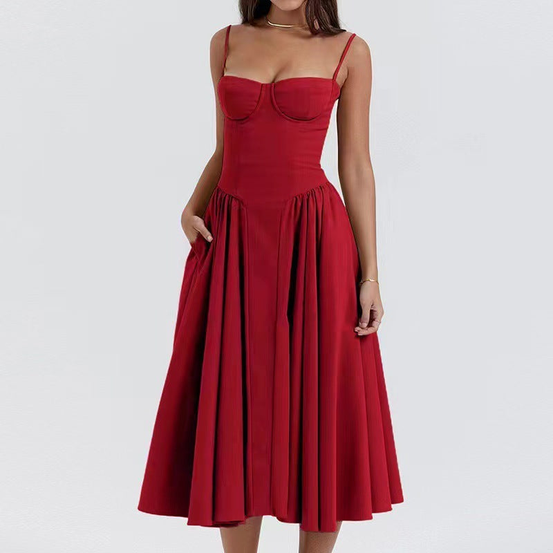 Red A-line dress with sweetheart bodice, spaghetti straps, pleated skirt
