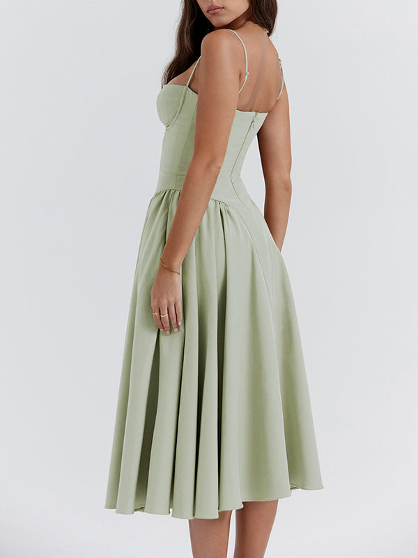 Light green A-line dress with sweetheart bodice, spaghetti straps, pleated skirt