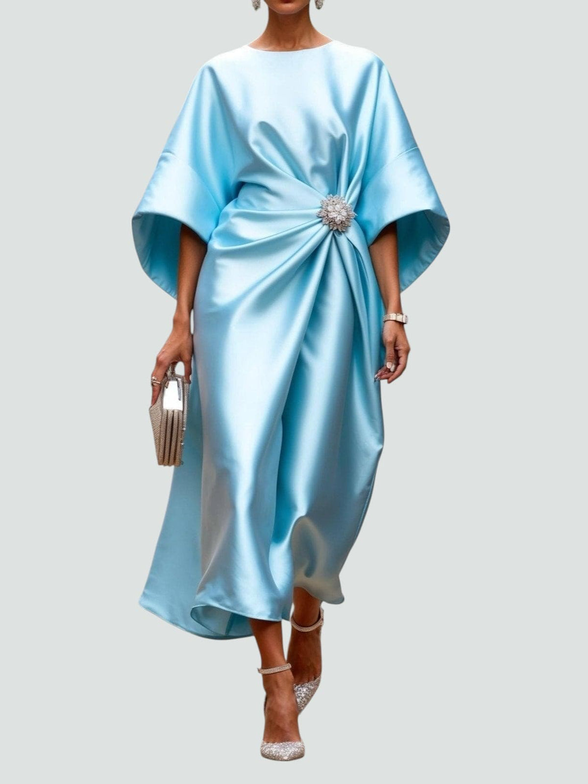 Light blue satin cape-sleeve maxi dress with draped waist and silver crystal brooch