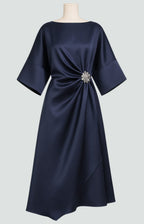 Navy satin short-sleeve midi dress with front drape detail and crystal brooch