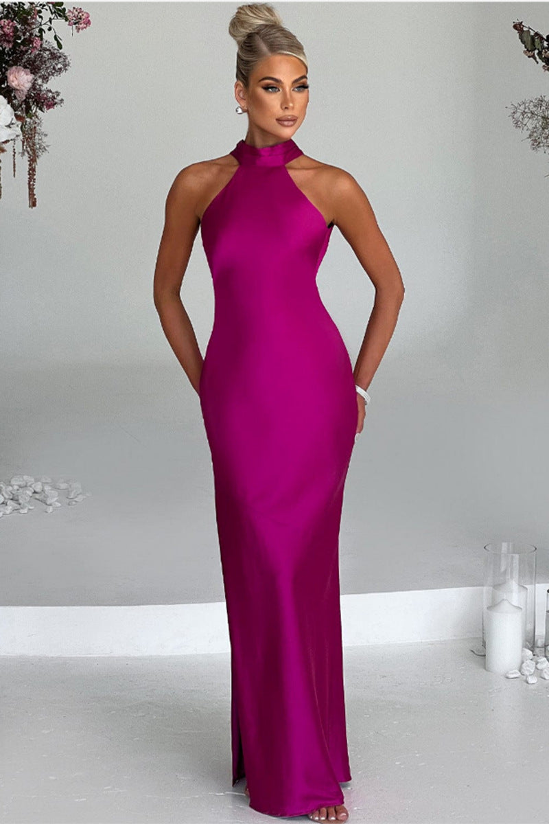 Purple satin halter neck maxi dress with sleeveless fitted bodice and long skirt