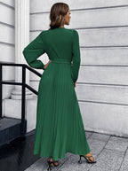 Women's green long-sleeve pleated wrap maxi dress with waist tie and V-neck