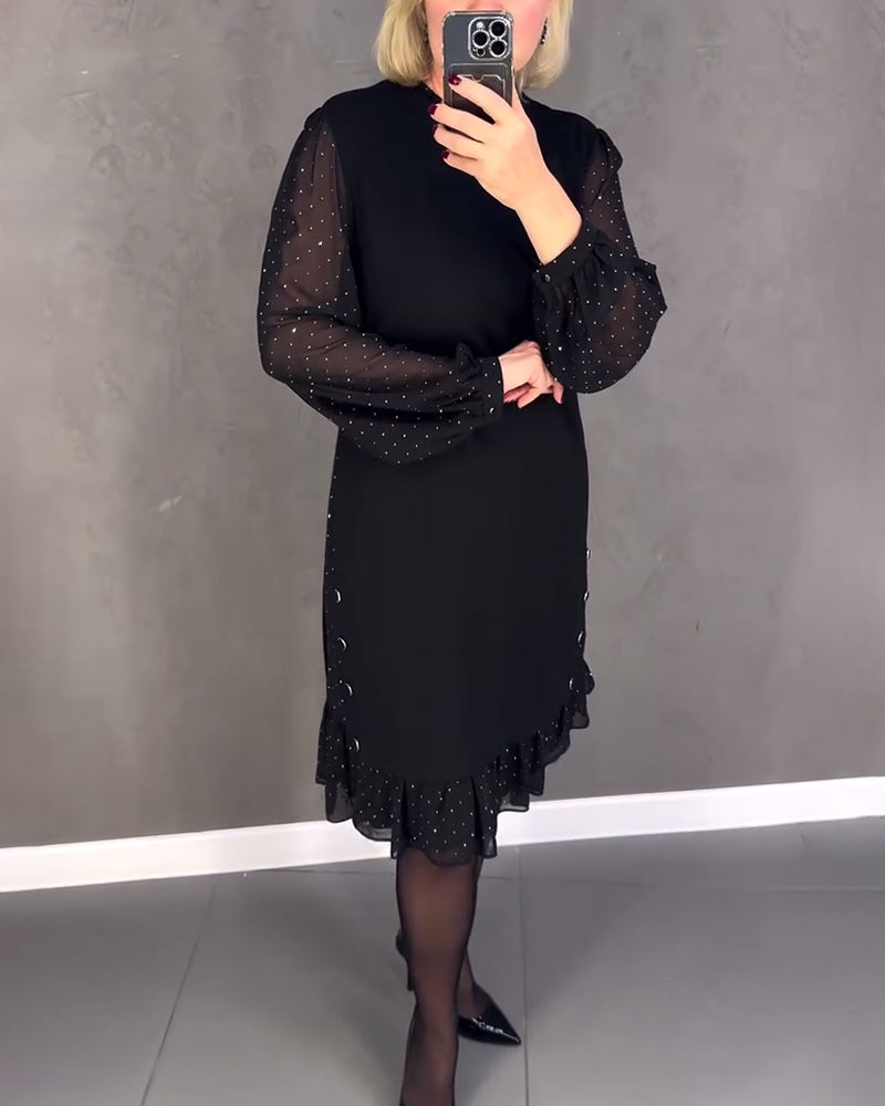 Black midi shift dress with sheer polka-dot long sleeves and softly ruffled hem