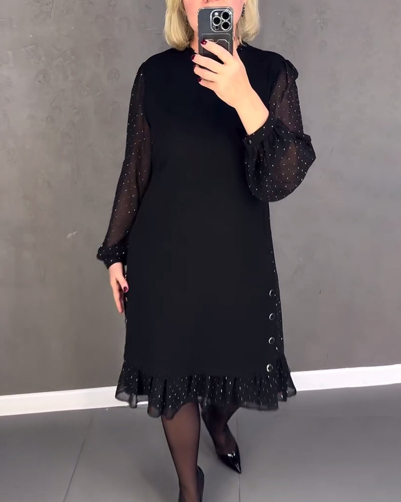 Black midi shift dress with sheer polka-dot sleeves and button-front with ruffled hem