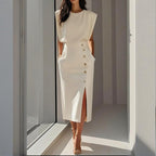 White structured midi dress with side button detail and front slit