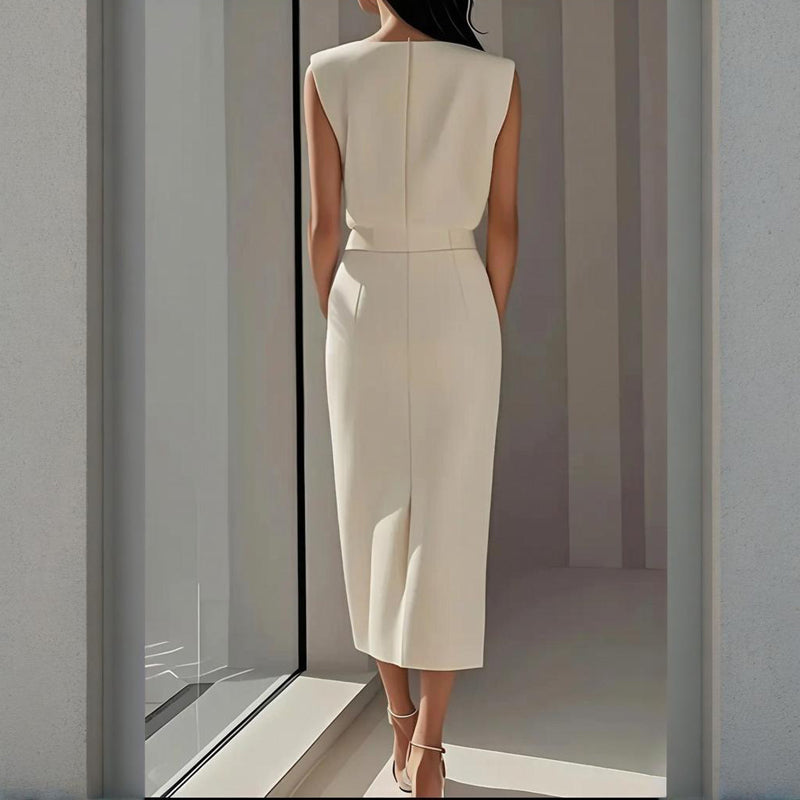 Ivory sleeveless midi dress back view with fitted waist and center seam