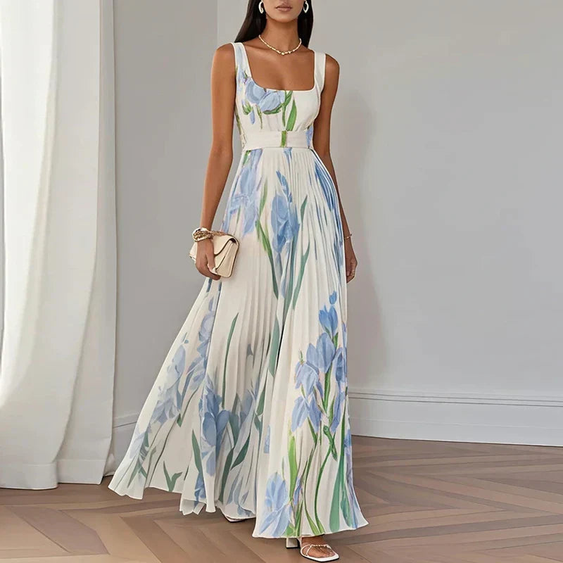 Floral pleated maxi dress in white with blue and green botanical print, square neckline