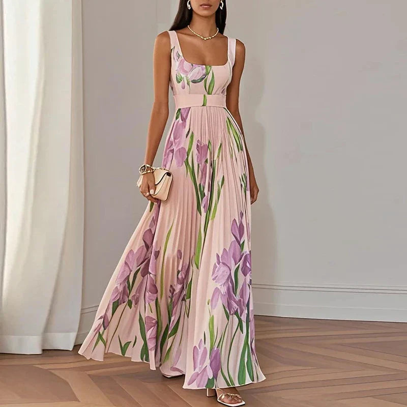 Floral pleated maxi dress in pink with purple and green botanical print, square neckline