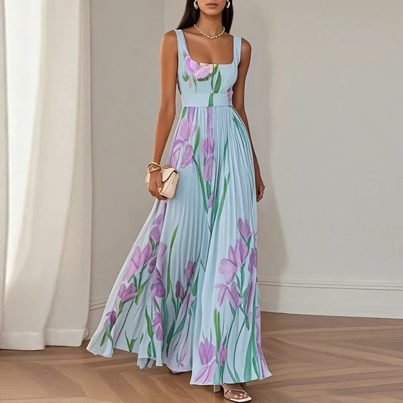 Floral pleated maxi dress in light blue with purple and green botanical print, square neckline