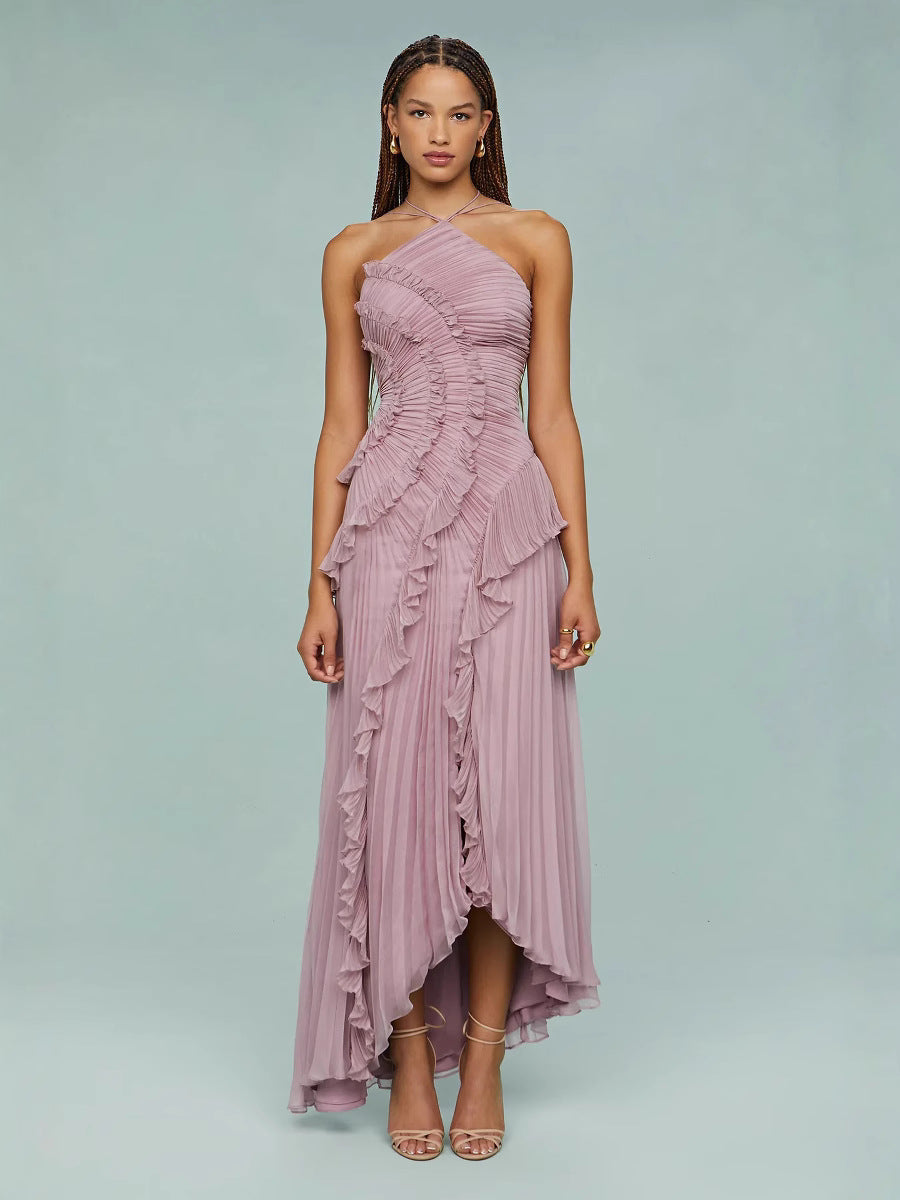 Light pink ruffle halter dress with spiral-like tiered ruffles and asymmetrical hem