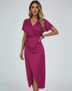 Hot pink wrap midi dress with V-neck, draped waist, and side split hem