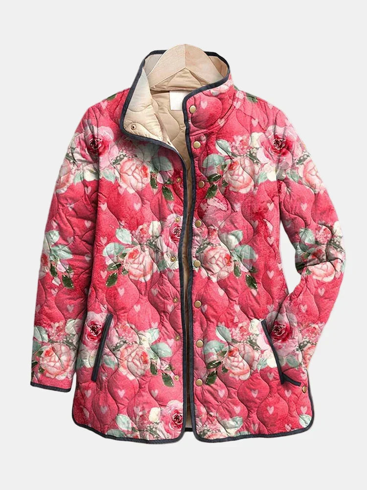 Pink floral quilted lightweight jacket with snap buttons and stand collar