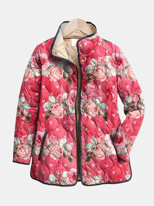 Pink floral quilted lightweight jacket with snap buttons and stand collar
