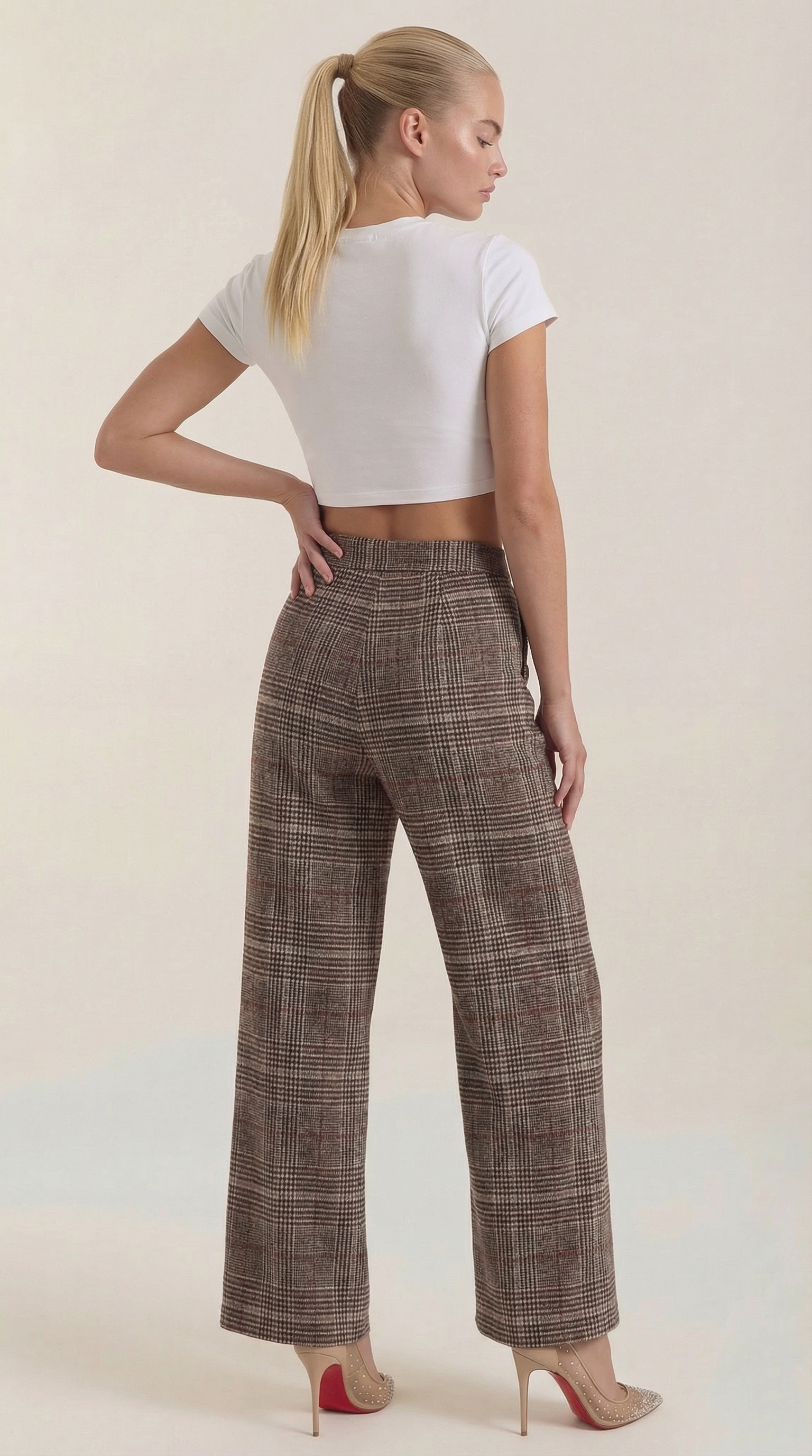 Brown plaid high-waisted wide-leg trousers, back view