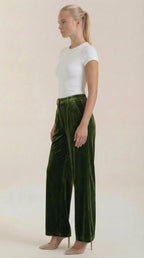 Dark green velvet wide-leg pants, side view, elastic waistband and wide legs