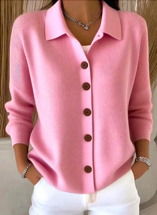 Pink knit button-front cardigan with pointed collar and long sleeves