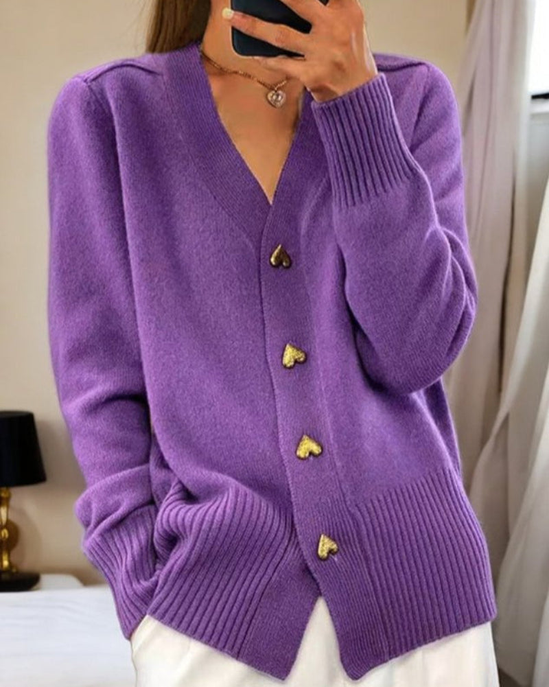Purple knit V-neck cardigan with gold heart buttons and ribbed hem and cuffs