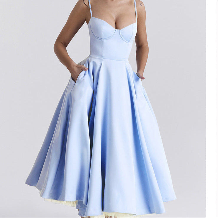 Light blue bustier midi dress with thin straps and flared layered tulle skirt