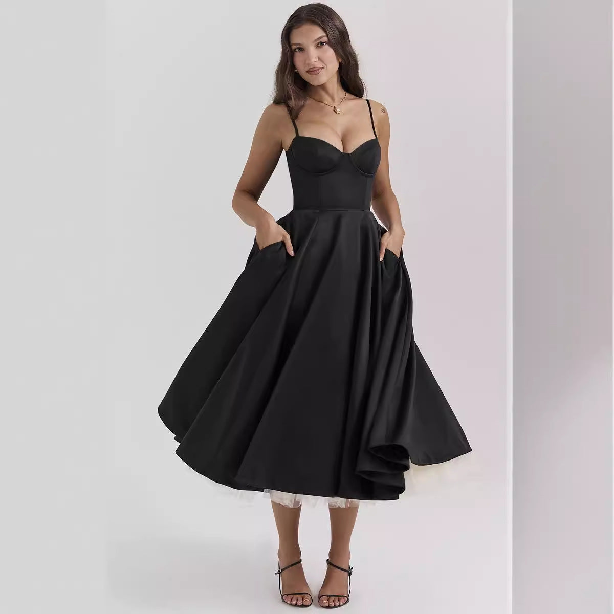 Black bustier midi dress with thin straps and layered tulle high-low skirt